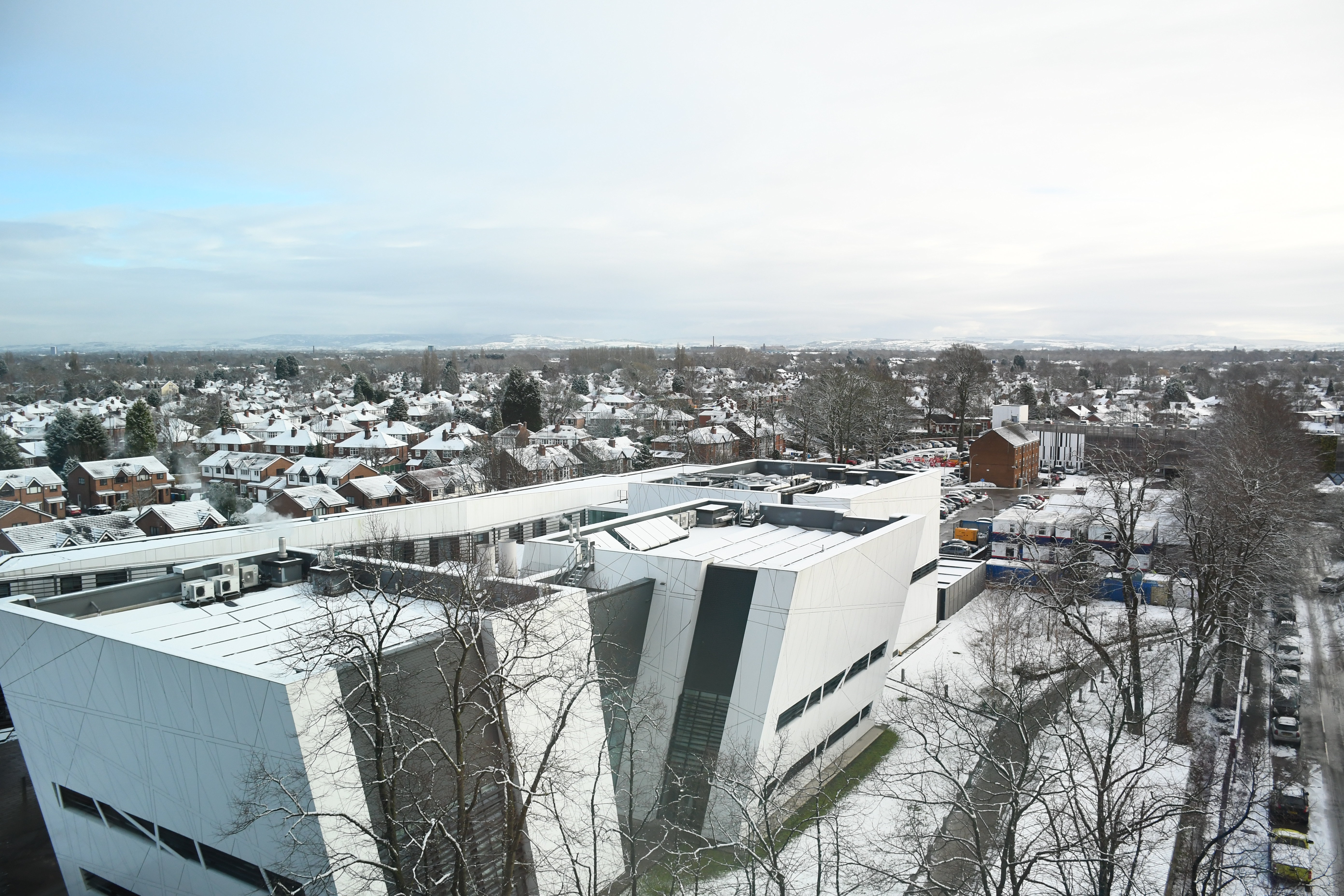 The Oglesby Cancer Research Centre, as seen from the Paterson Building, in the snow