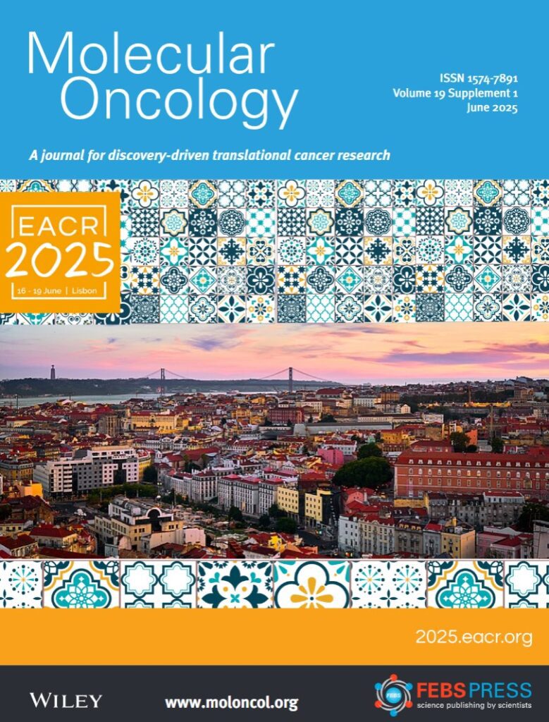 Front cover of Molecular Oncology for the EACR special edition, with striking blue and yellow colour scheme, a scene of Lisbon at sunset and a tiled pattern background