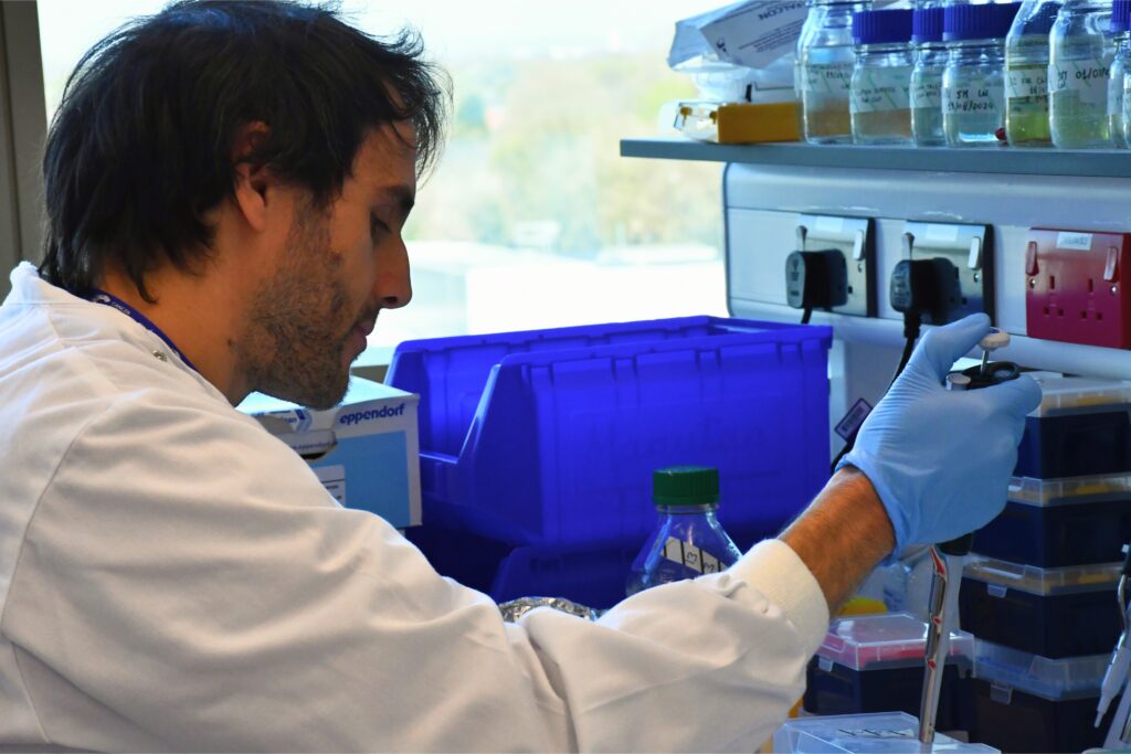 Image of Dr Luciano Nicosia working in the laboratory