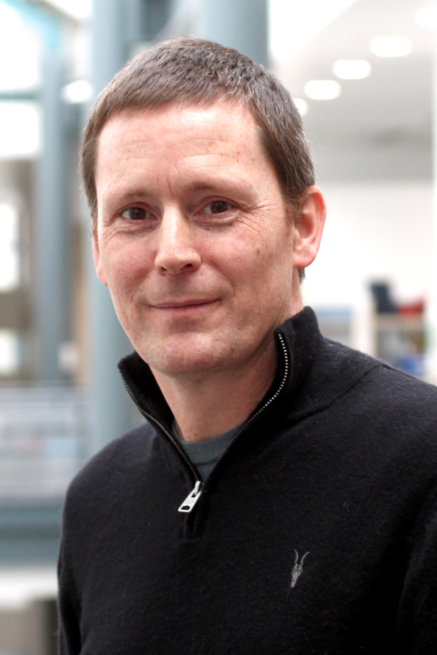A headshot of Magnus Rattray